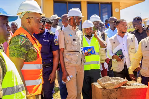 Officials from the DRC and Uganda at the bridge site at the Mahagi-Goli border